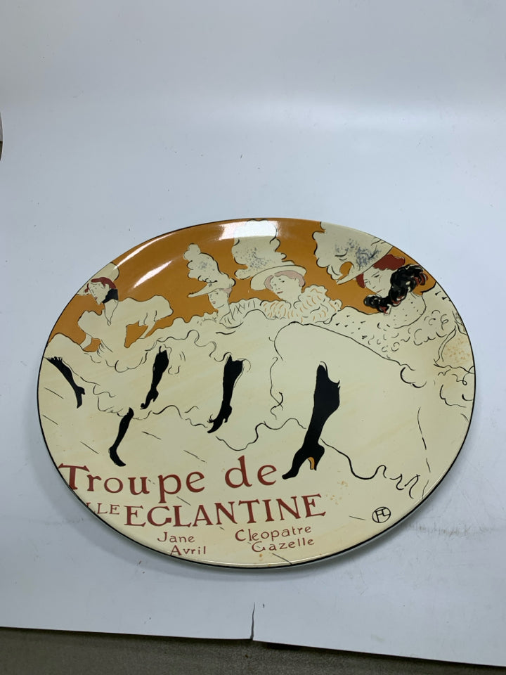 OVAL PLATTER WOMAN LINE DANCING W/ LEGS UP.