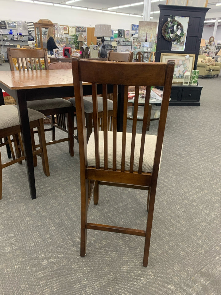 WOOD HIGH TOP TABLE W/ BLACK LEGS 4 UPHOLSTERED.