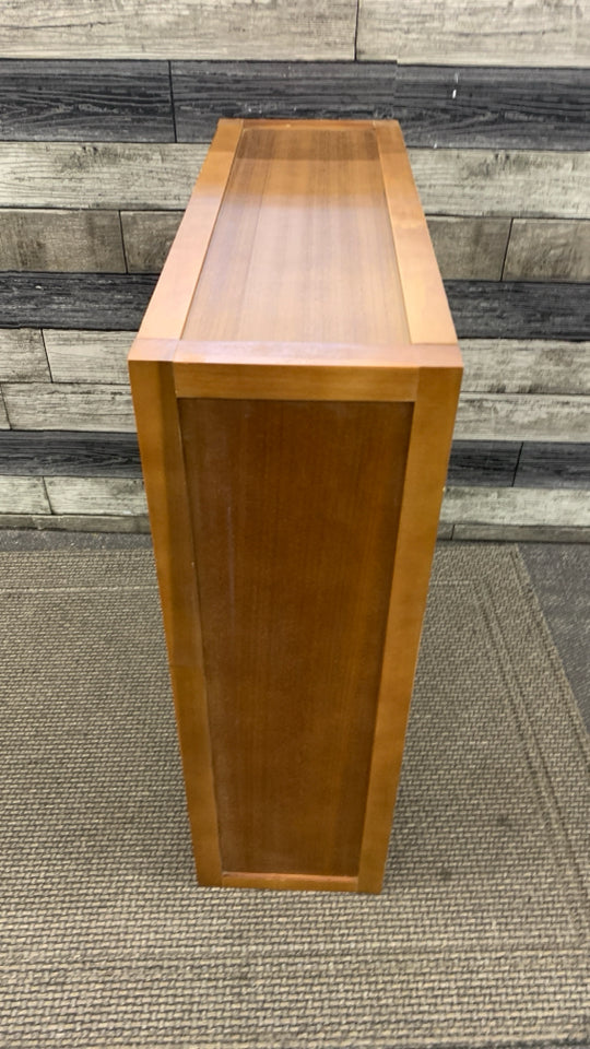 WOOD BATHROOM CABINET W/SLOTTED DOORS 3 SHELVES.