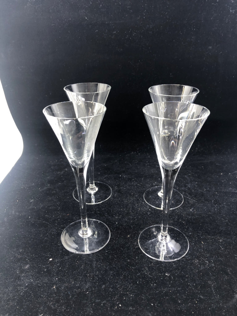 4 CLEAR SMALL FLUTE GLASSES.