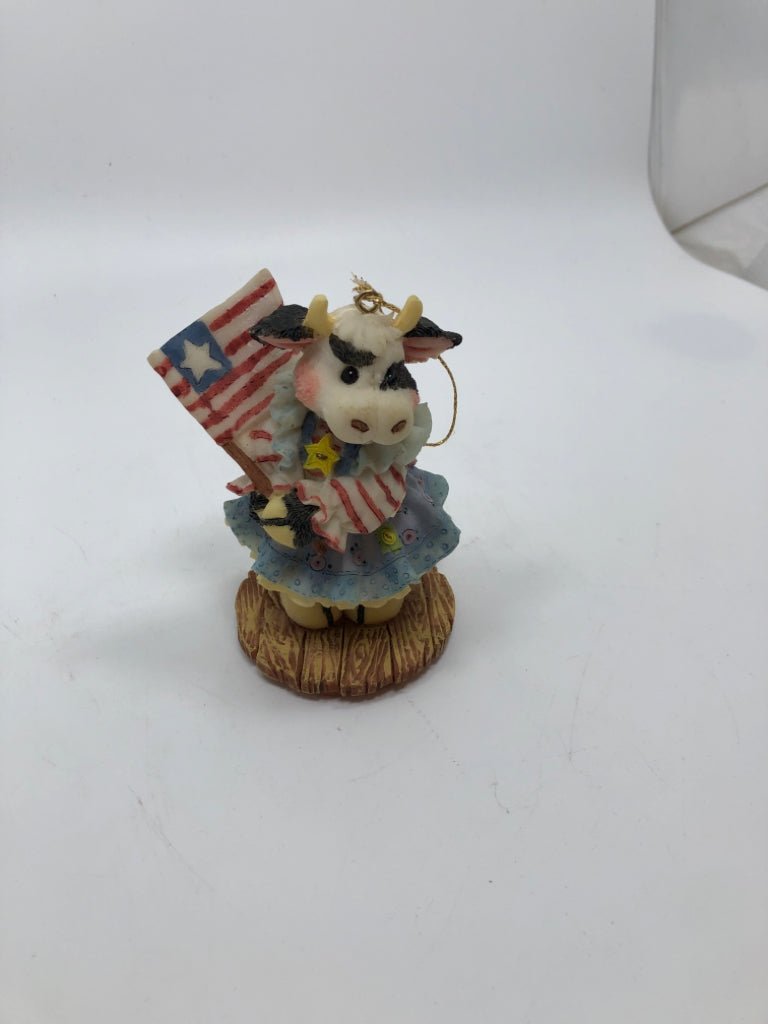AMERICANA COW ORNAMENT.