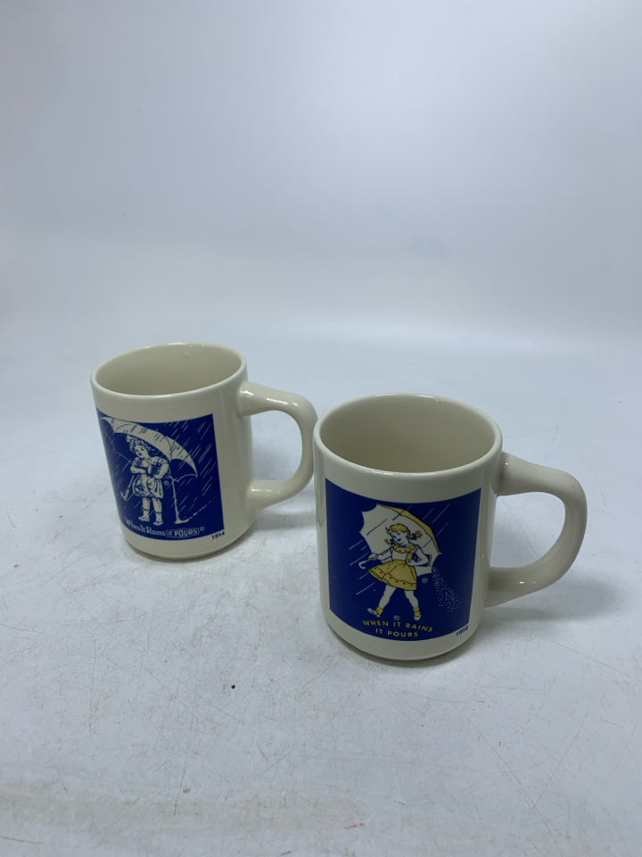 2 VTG WHEN IT RAINS IT POUR SALT MUGS.