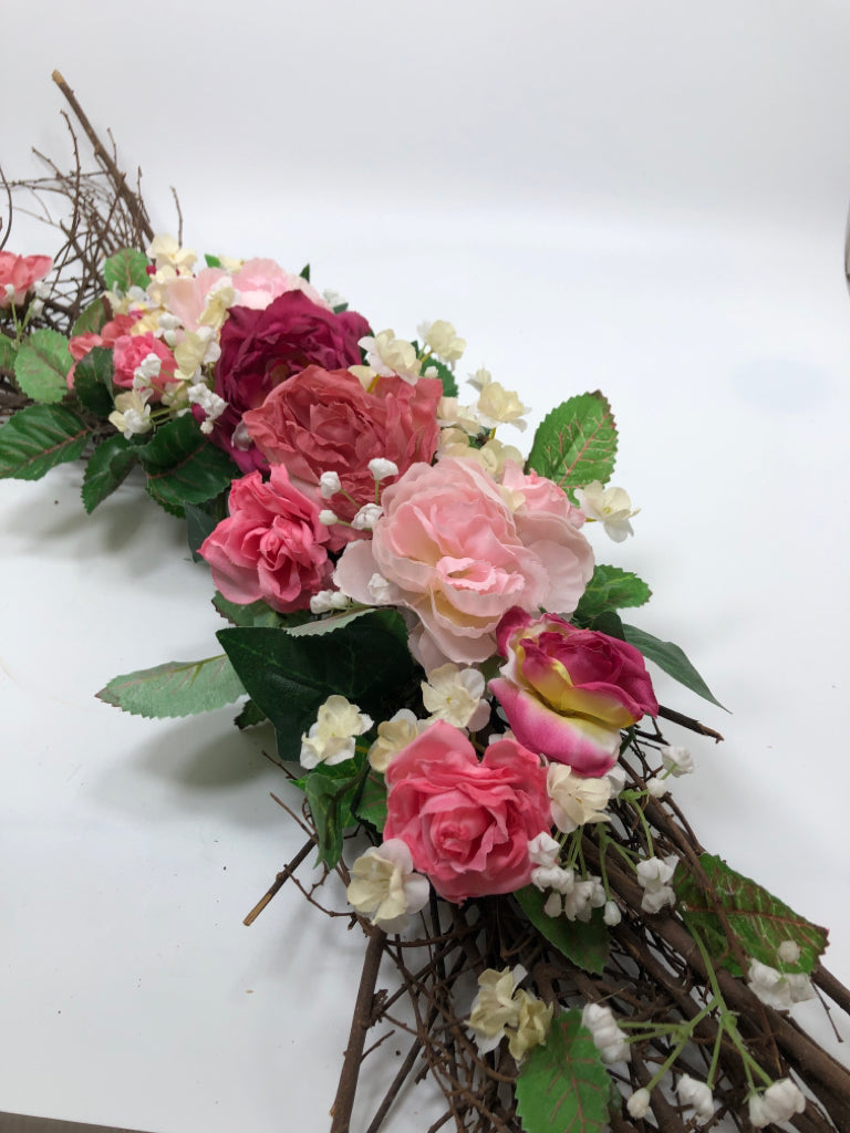 FAUX FLORAL AND TWIG SWAG.