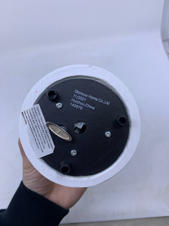 WHITE BASE W/ RAINBOW INSIDE.