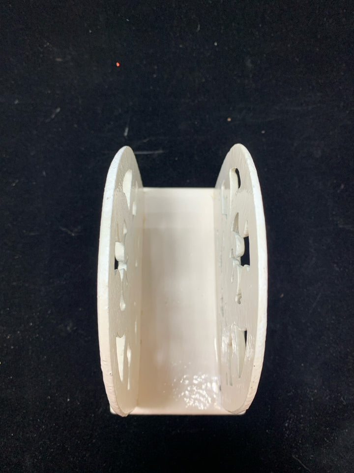WHITE METAL NAPKIN HOLDER.