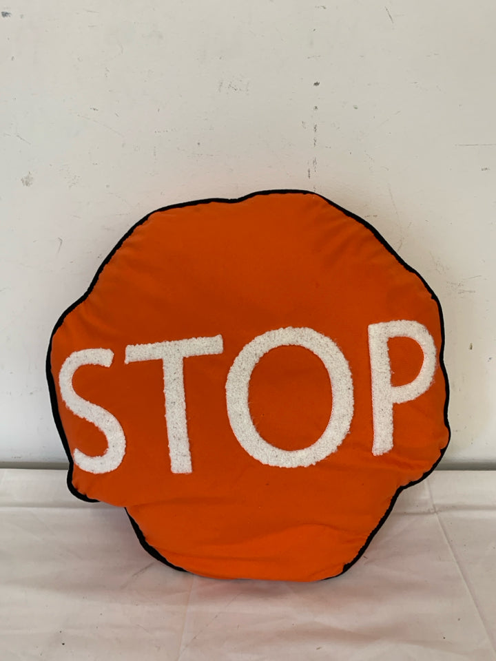 ORANGE STOP SIGN PILLOW.