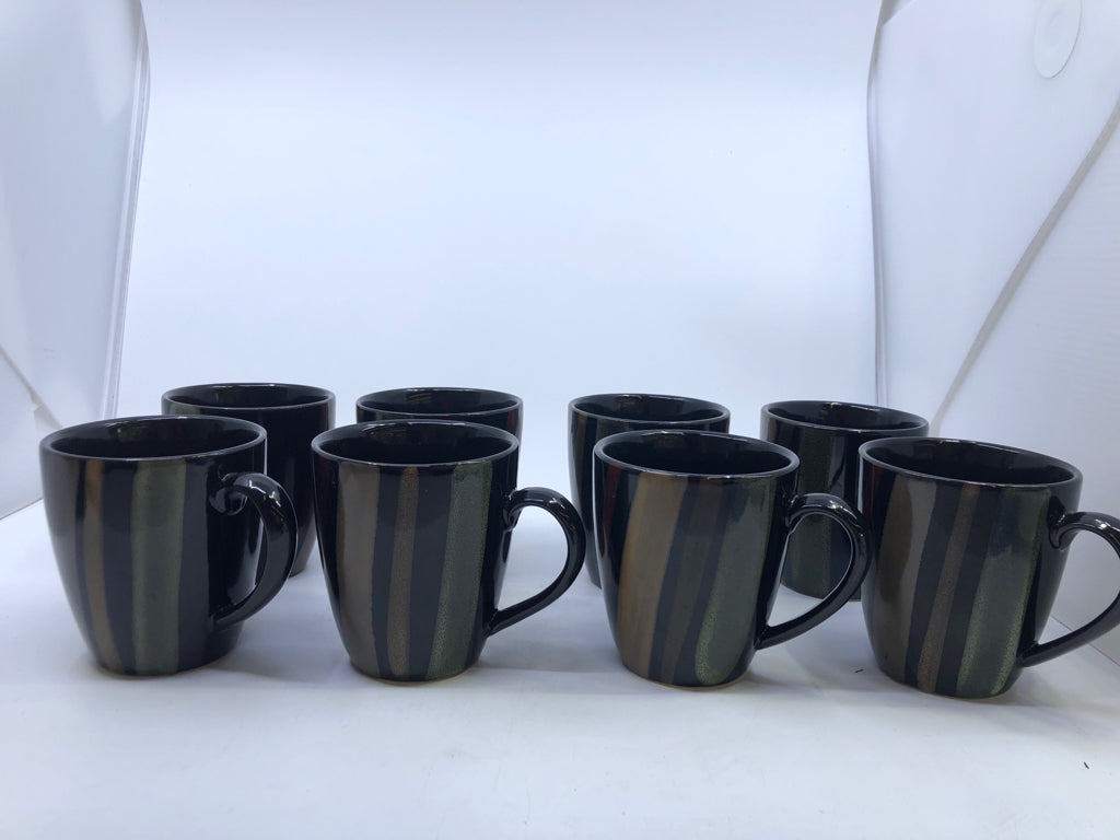 8 BLACK COFFEE MUGS W/TAN RED GREEN STRIPES.
