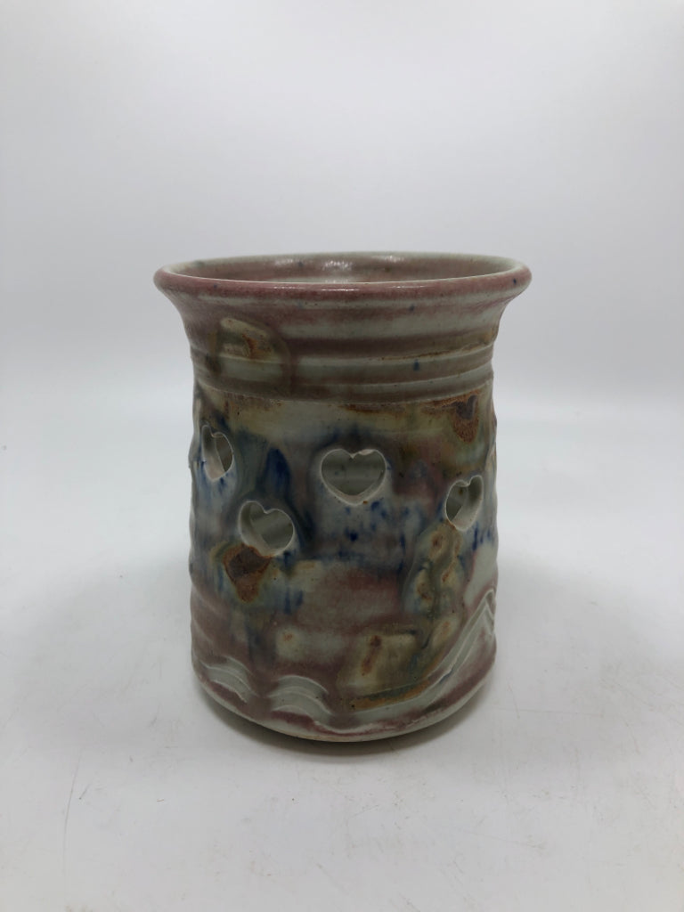 PINK GLAZE POTTERY VOTIVE HOLDER W/HEART CUTOUTS.