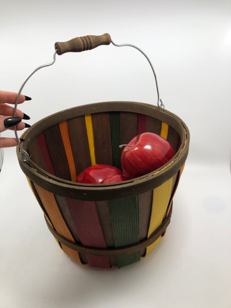 MULTI-COLORED WOODEN PAIL W/BAG OF APPLES.