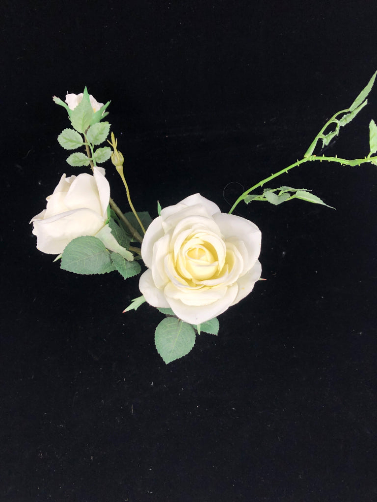 SMALL WHITE FAUX ROSES IN GLASS JAR.