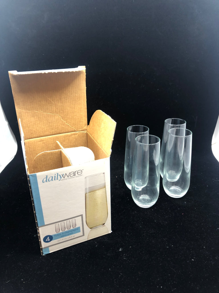 NIB 4 STEMLESS CHAMPAGNE FLUTES.