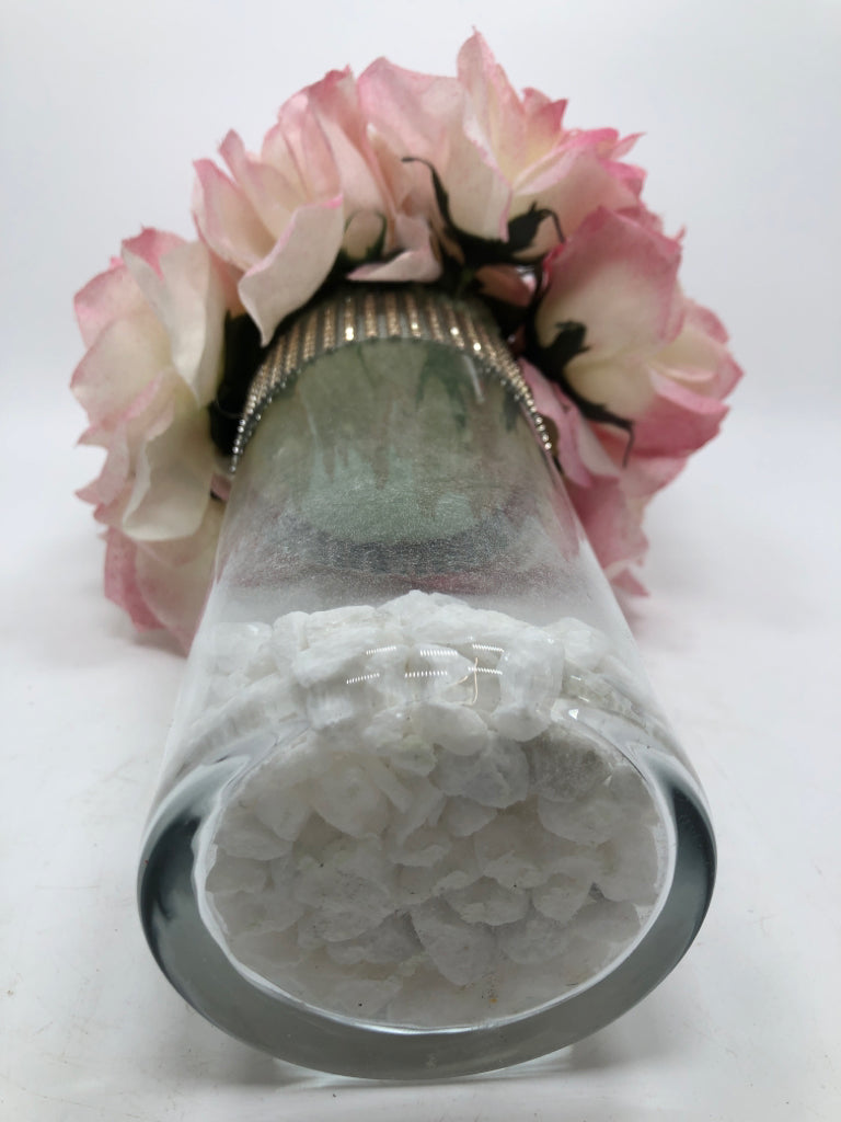 WHITE ROCK FILLED VASE W/PINK FLORALS.
