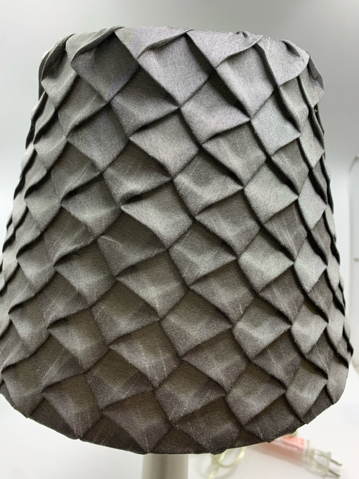 SILVER METAL BASE LAMP W/GREY PLEATED SHADE.