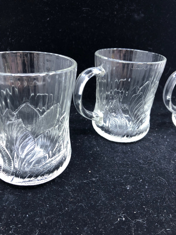 4 GLASS FLORAL MUGS.