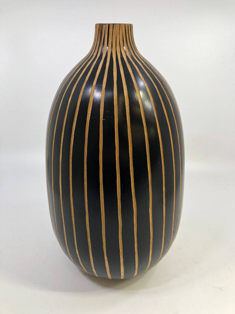 WOODEN CARVED BLACK STRIPPED VASE.