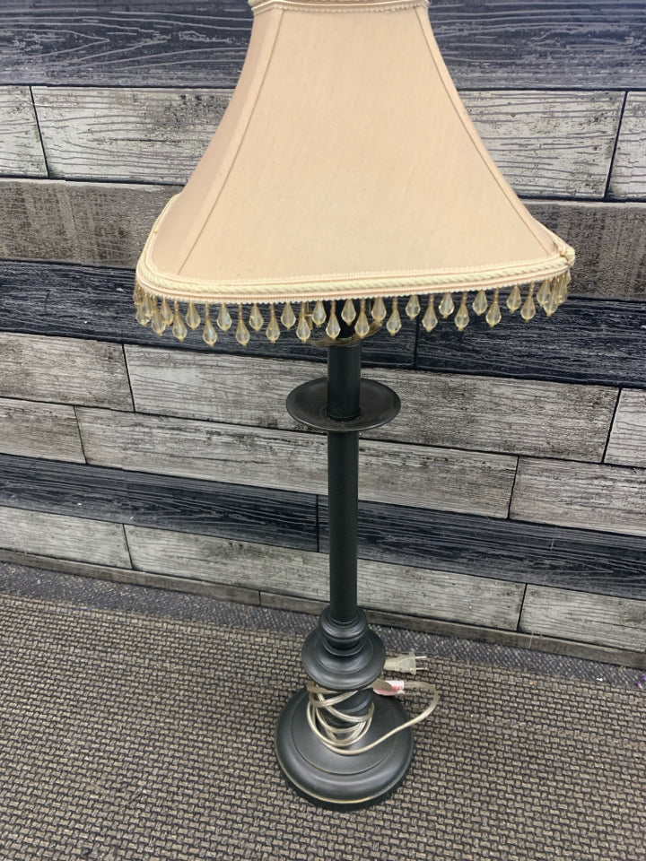 SILVER SKINNY BASE LAMP W TASSEL SHADE.