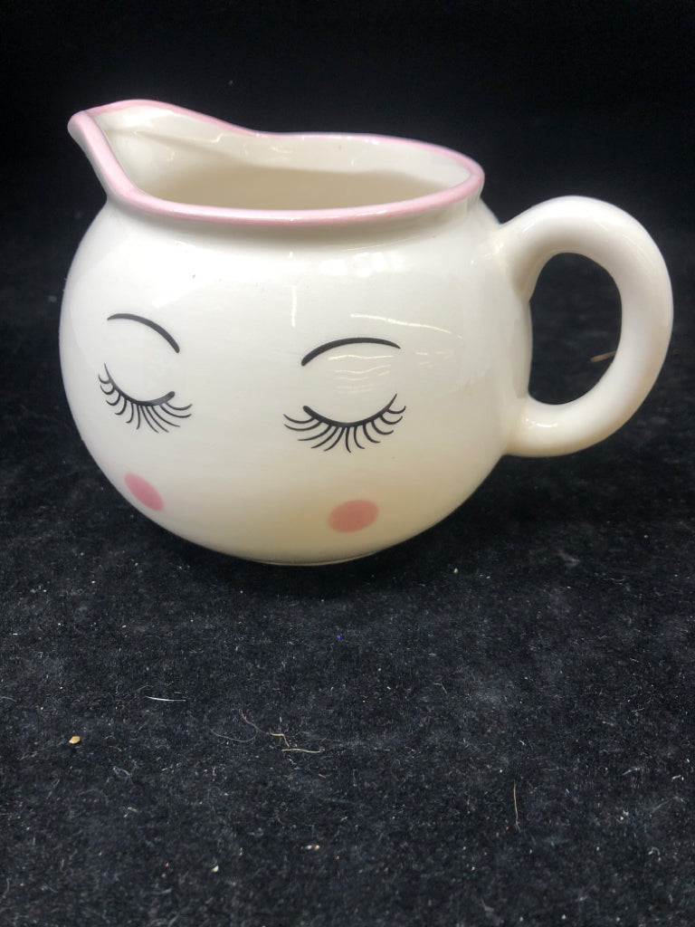 WOMANS FACE SMALL PITCHER.