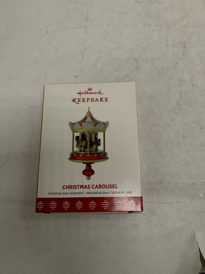 IN BOX CHRISTMAS CAROUSEL HALLMARK ORNAMENT.