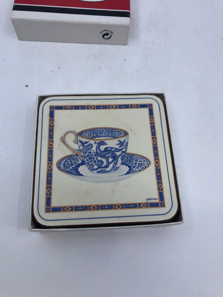 6 BLUE TEACUP PATTERN COASTERS IN BOX.