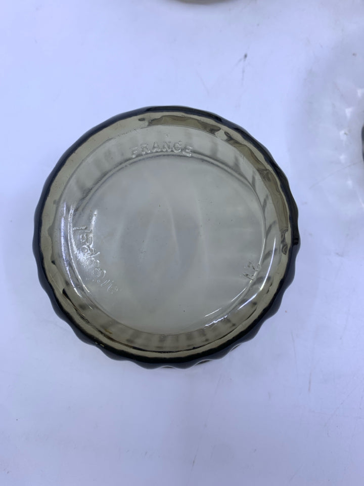 4 BROWN RIBBED GLASS SPICE BOWLS.