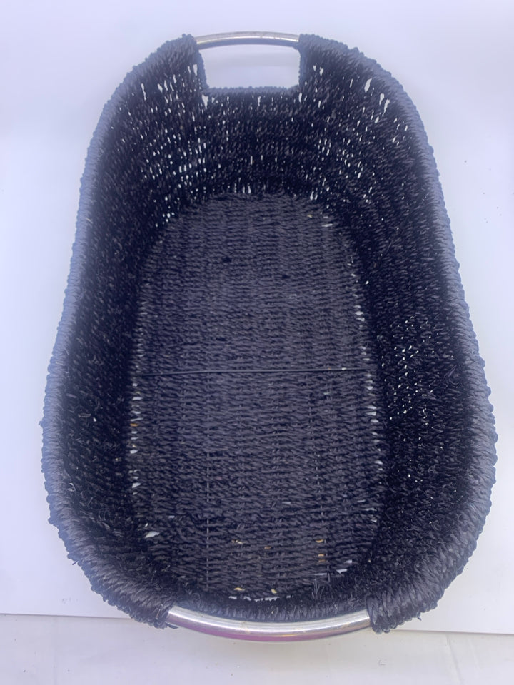 BLACK WOVEN OVAL BASKET W/ SILVER HANDLES.