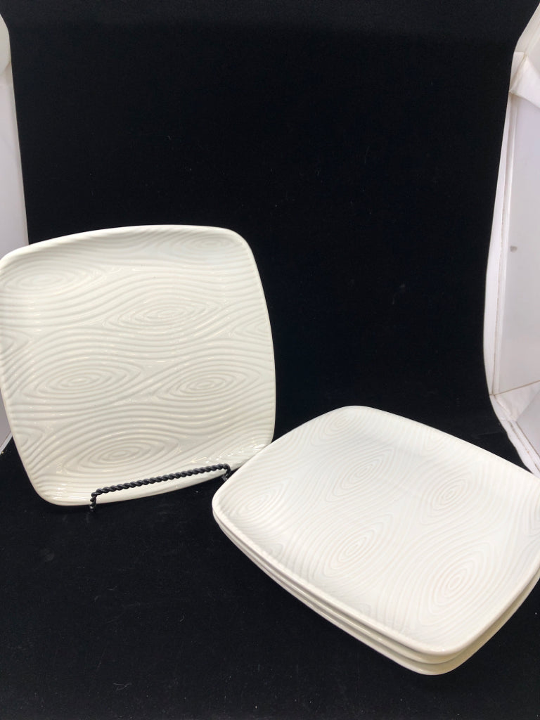 4 TEMPTATIONS WHITE SWIRL PORCELAIN DINNER PLATES.