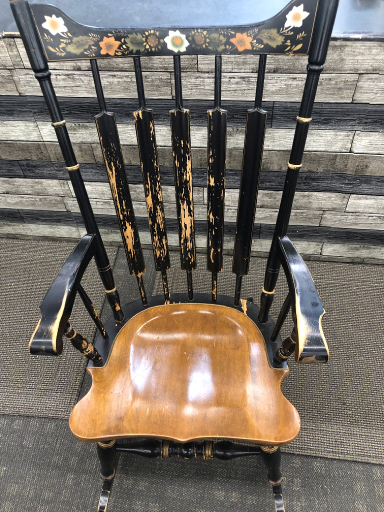 BLACK/BROWN WOOD ROCKING CHAIR W/PAINTED FLOWERS.