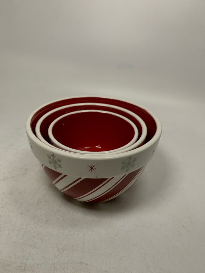 3 NESTING RED WHITE STRIPED BOWLS W/ SNOWFLAKES.