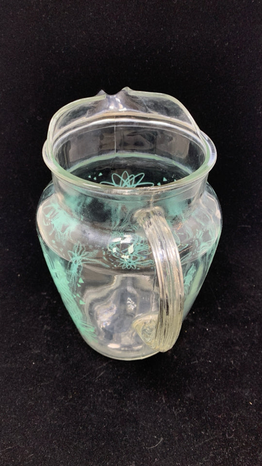 VTG TEAL STARBURST GLASS PITCHER W/ICE LIP.