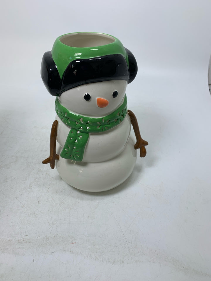 CERAMIC SNOWMAN W/ GREEN SCARF & EARMUFFS TEA LIGHT HOLDER.