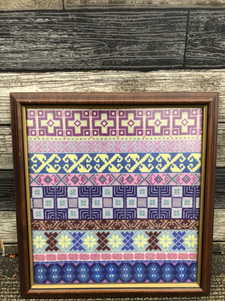 BLUE/PURPLE FRAMED NEEDLEPOINT.