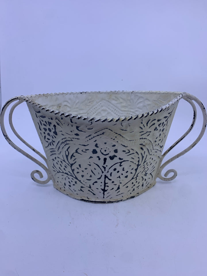 WHITE METAL FOOTED PLANTER.