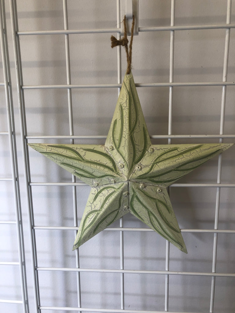 CREAM PAINTED STAR WALL HANGING.