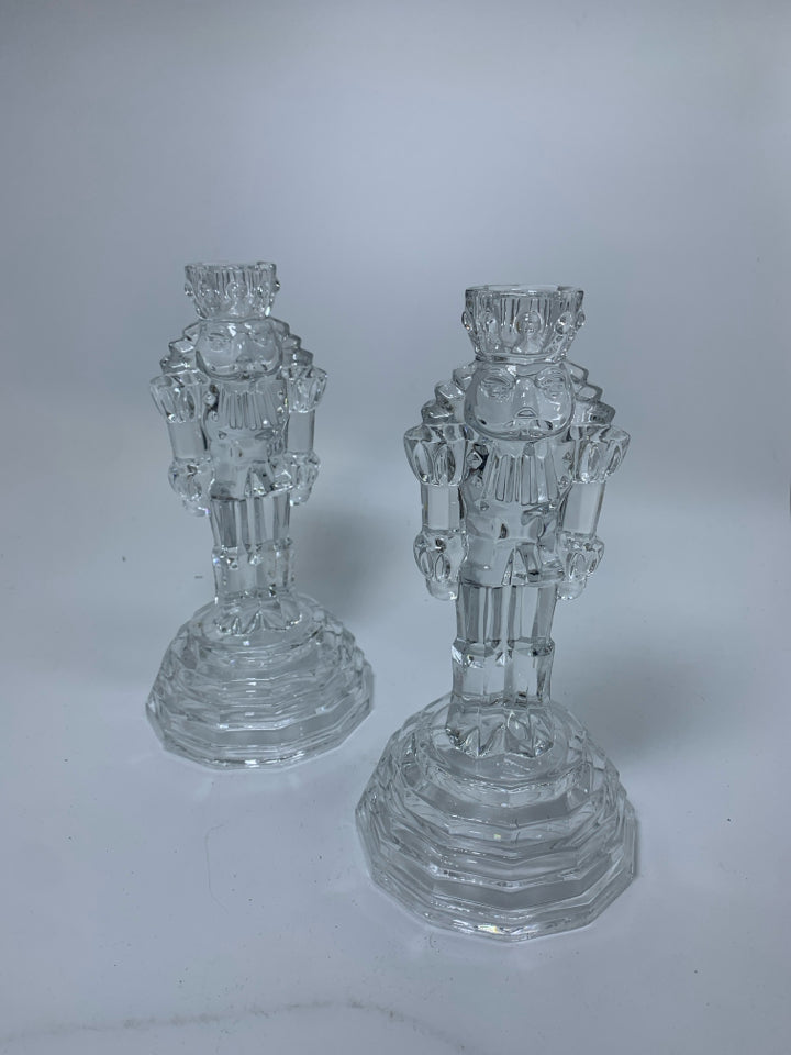 2 CRYSTAL NUTCRACKER TAPERED CANDLE HOLDERS.