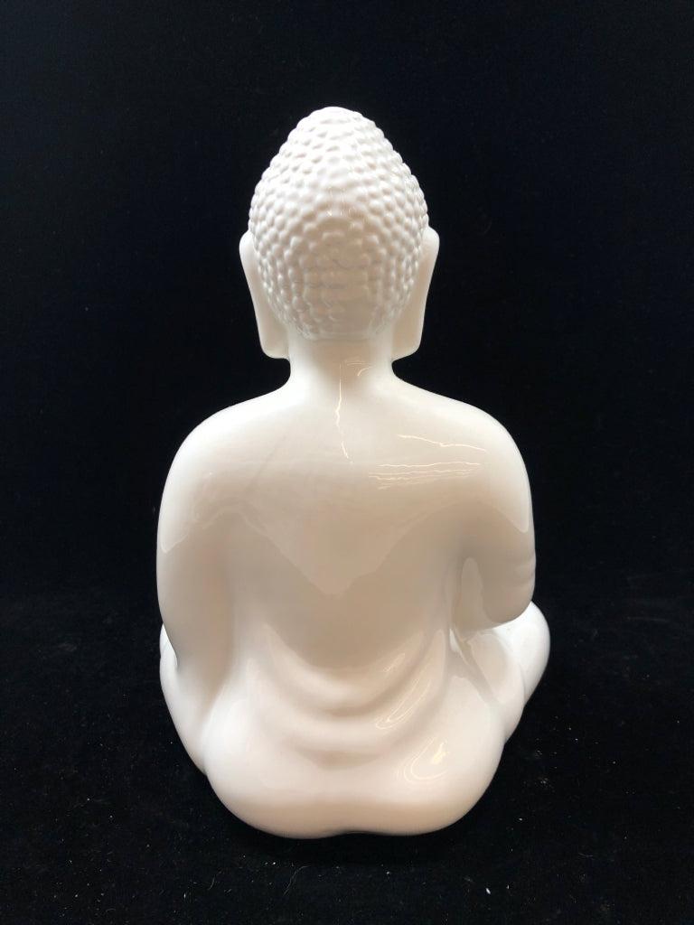 WHITE CERAMIC BUDDHA SCULPTURE.