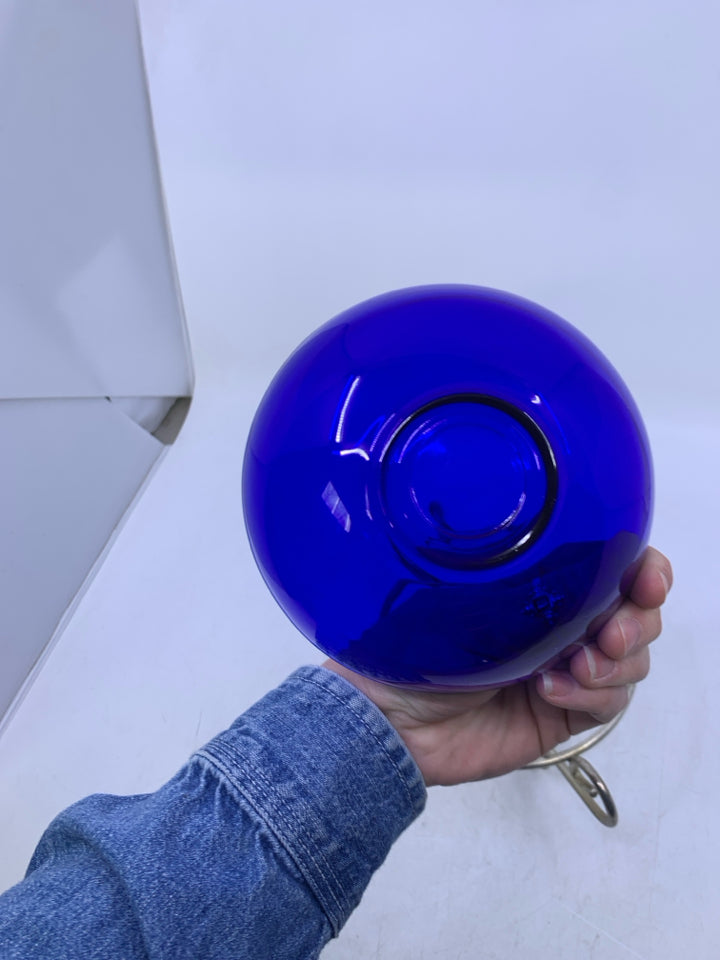 SILVER METAL FOOTED BASE W/ COBALT BLUE GLASS INSERT.