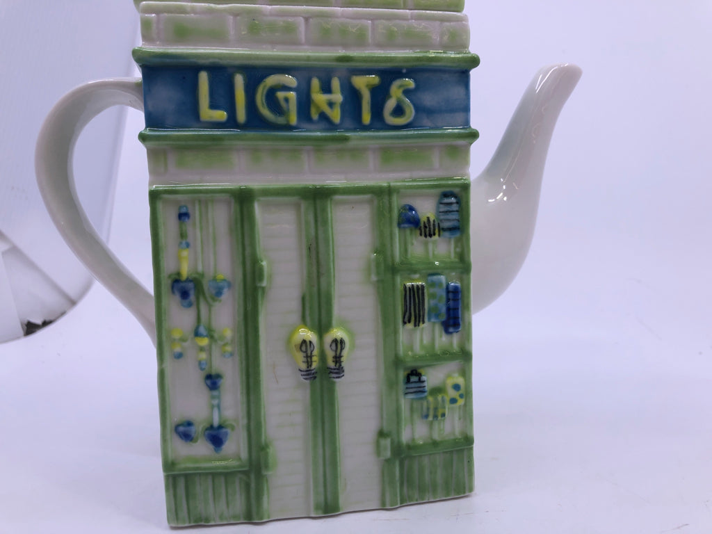 STOREFRONT SHAPED DECOR TEAPOT.