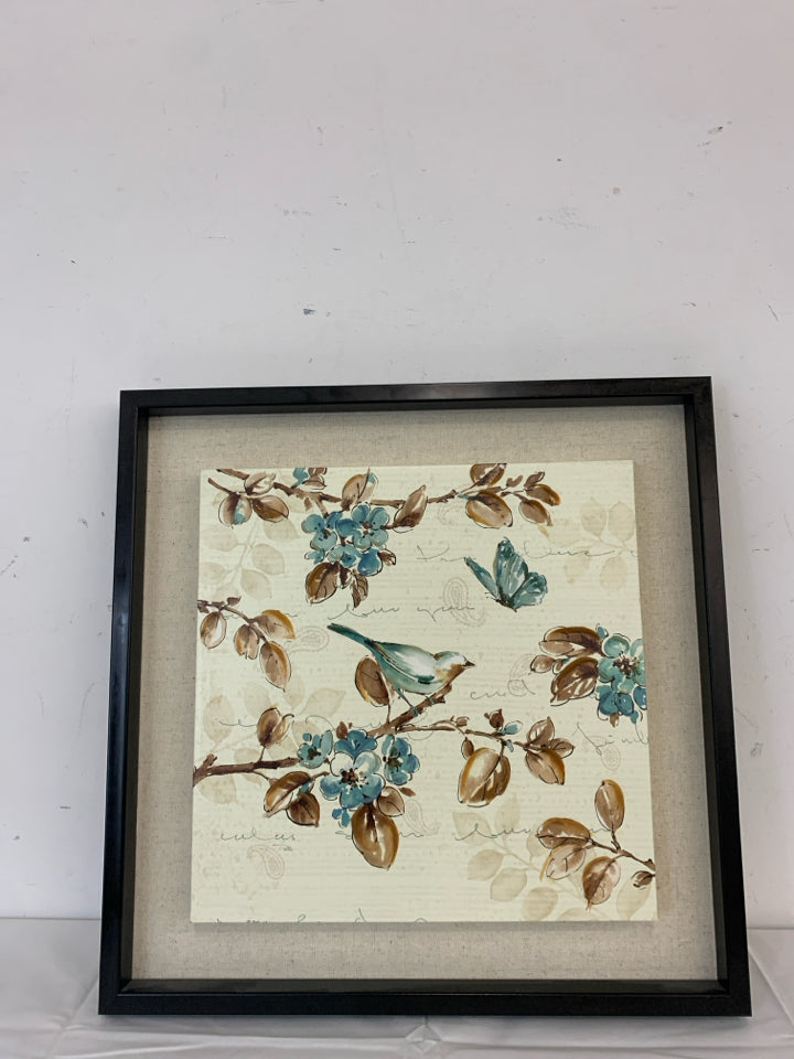 BIRD CANVAS ON DARK WOOD FRAME.