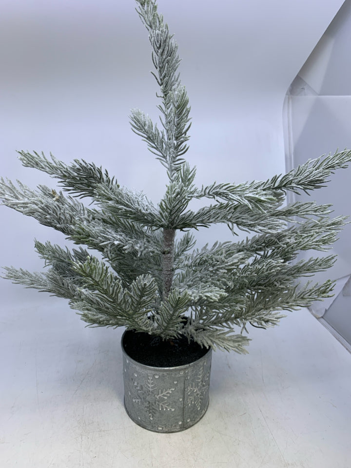 FAUX SNOWY TREE IN METAL SNOWFLAKE PLANTER.