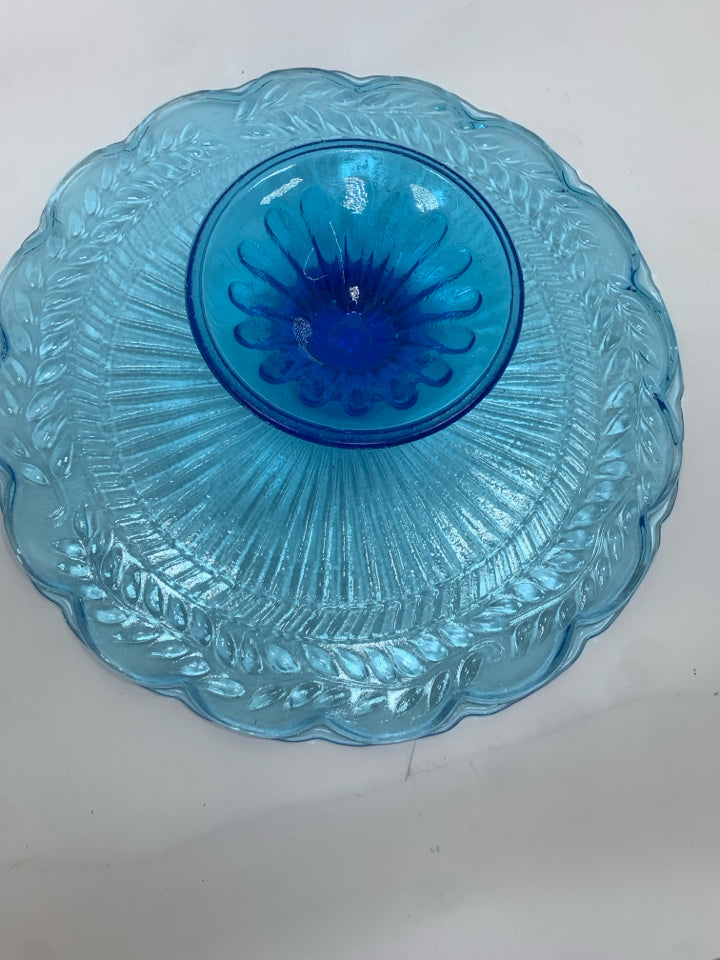 BLUE GLASS CAKE PLATE W/EMBOSSED LEAVES AND RUFFLE EDGE.