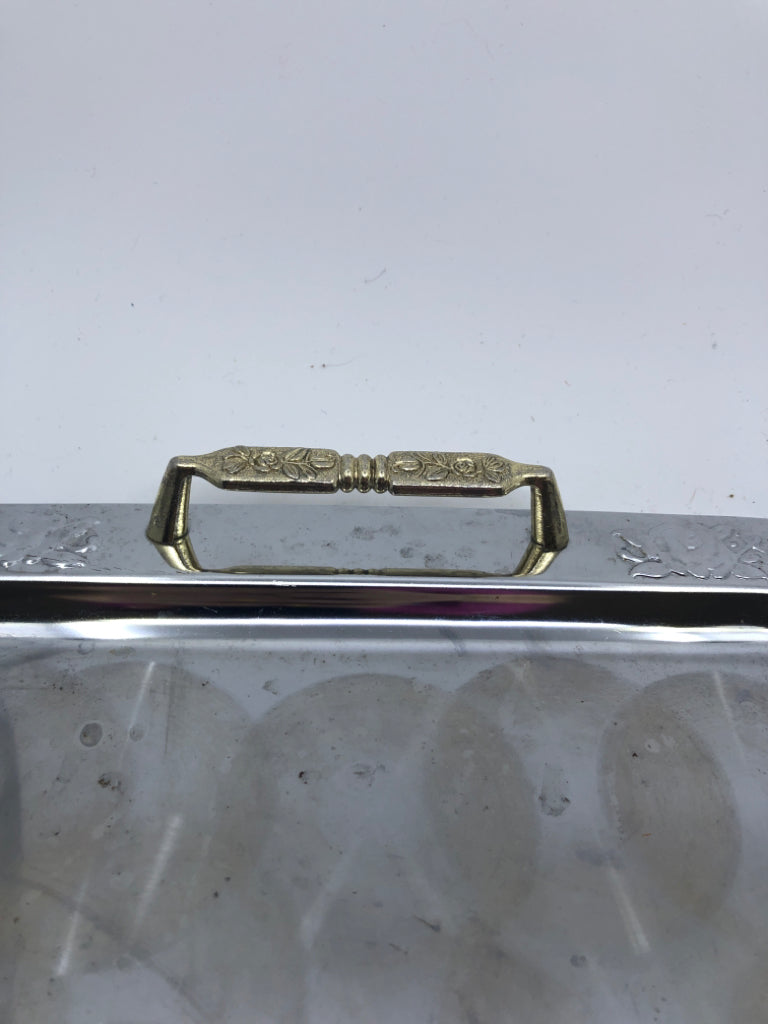 SILVER METAL SERVING TRAY W GOLD ACCENTED HANDLES.