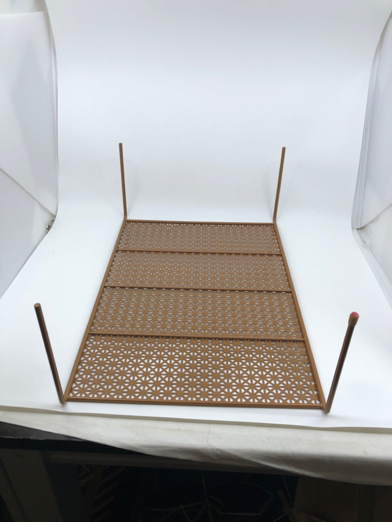 LIGHT BROWN METAL CABINET SHELF ORGANIZER W/ TRIANGLE PATTERN.