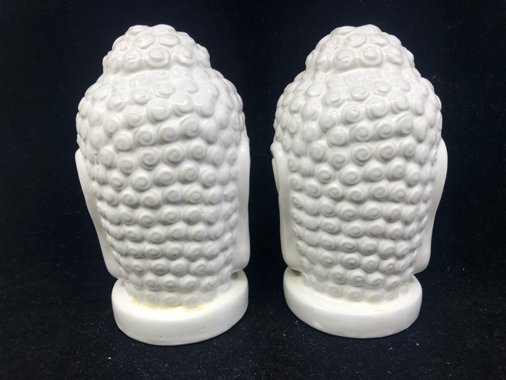 2 WHITE CERAMIC BUDDHA HEADS.