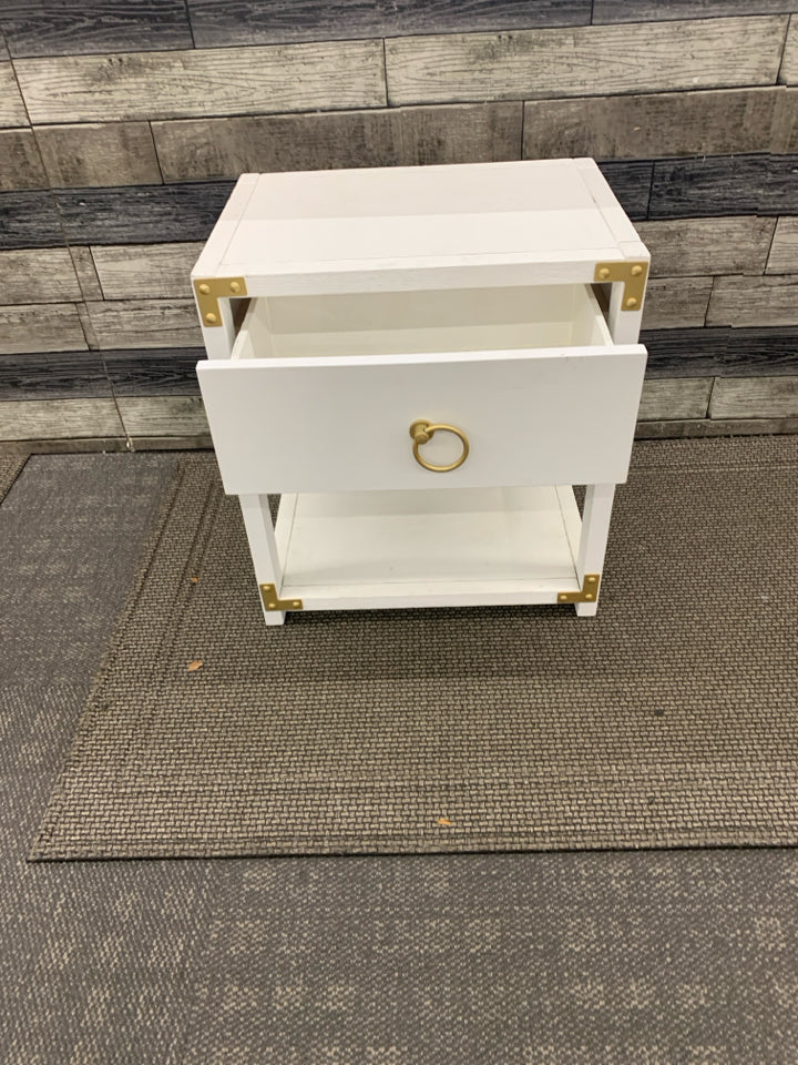 WHITE LOW TWO TIER SIDE TABLE W/ GOLD HARDWARE CIRCLE HANDLES.