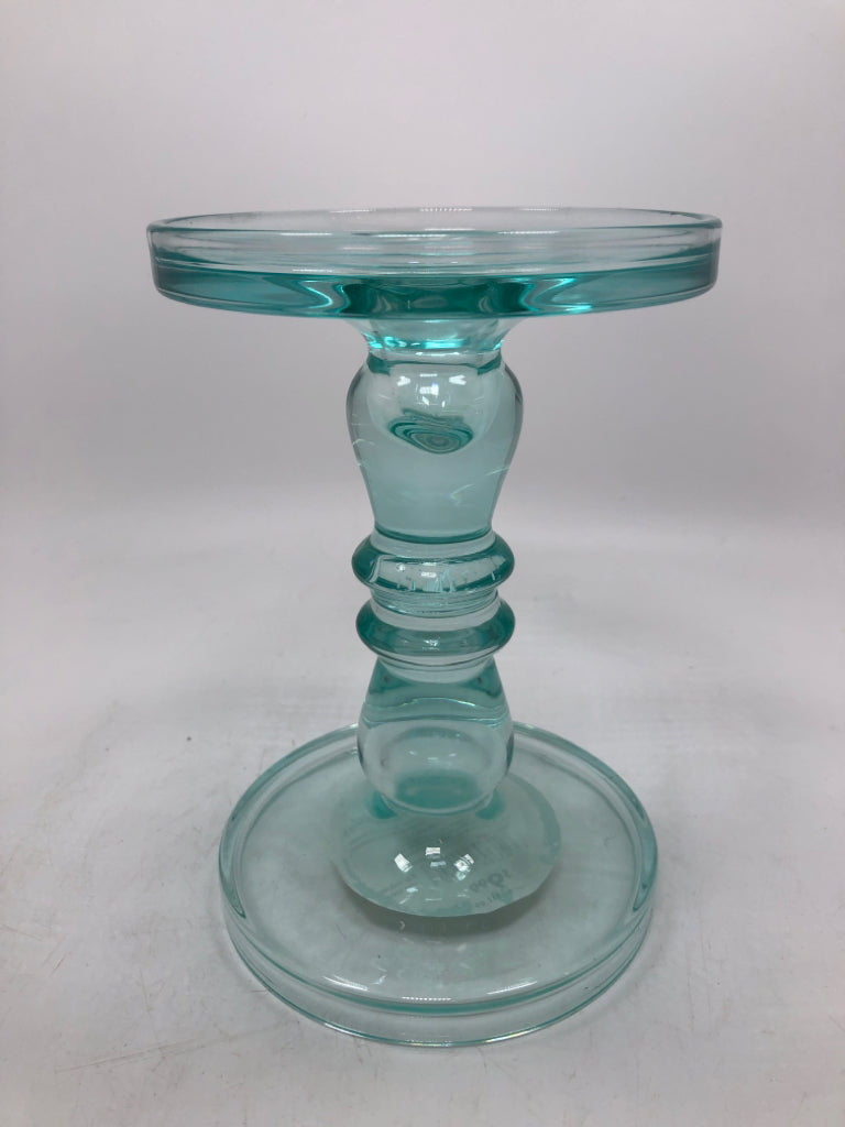 LT BLUE GLASS PILLAR CANDLE HOLDER.