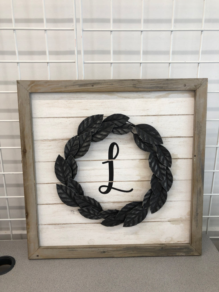 "L" IN RUSTIC LIGHT GREY WOOD FRAME.