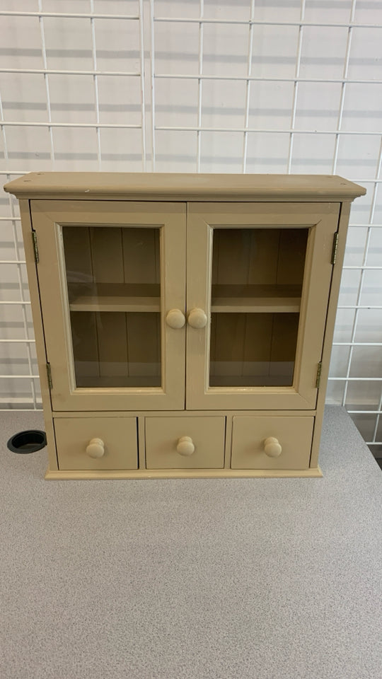 TAN PAINTED WOOD CABINET W/DOORS 3 DRAWERS.