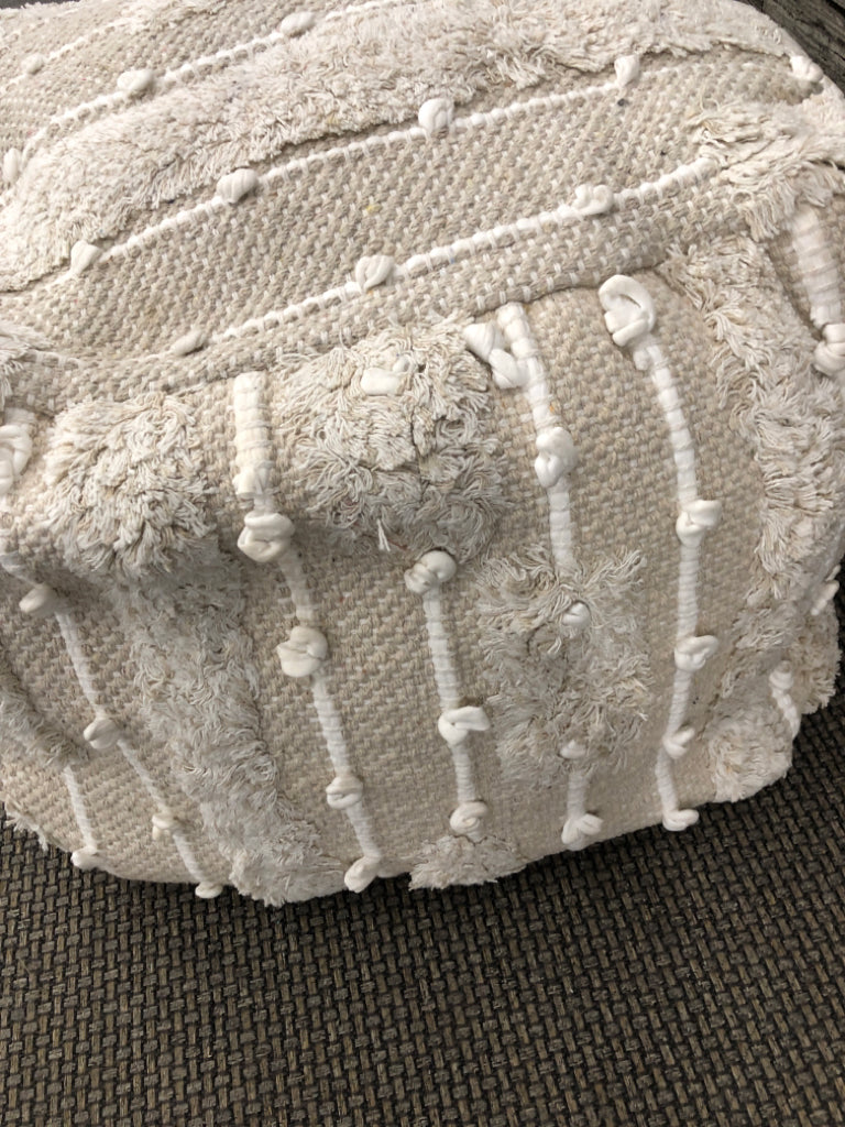 BEIGE TEXTURED COTTON WOVEN POUF OTTOMAN.