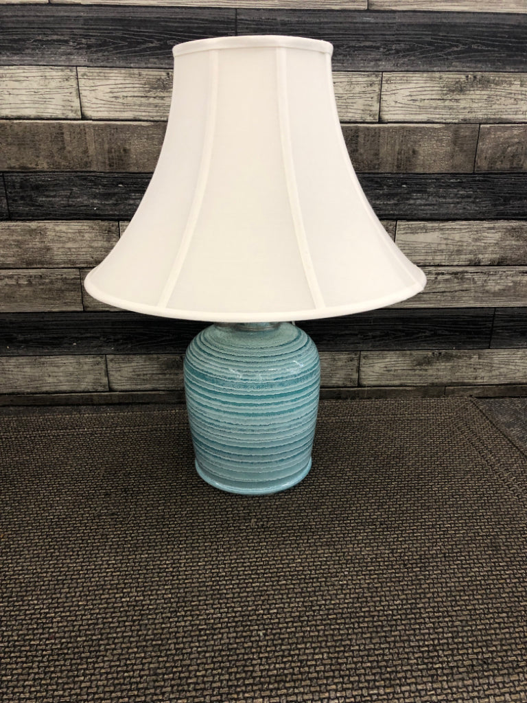 BLUE STRIPPED LAMP W/WHITE FLARE SHADE.