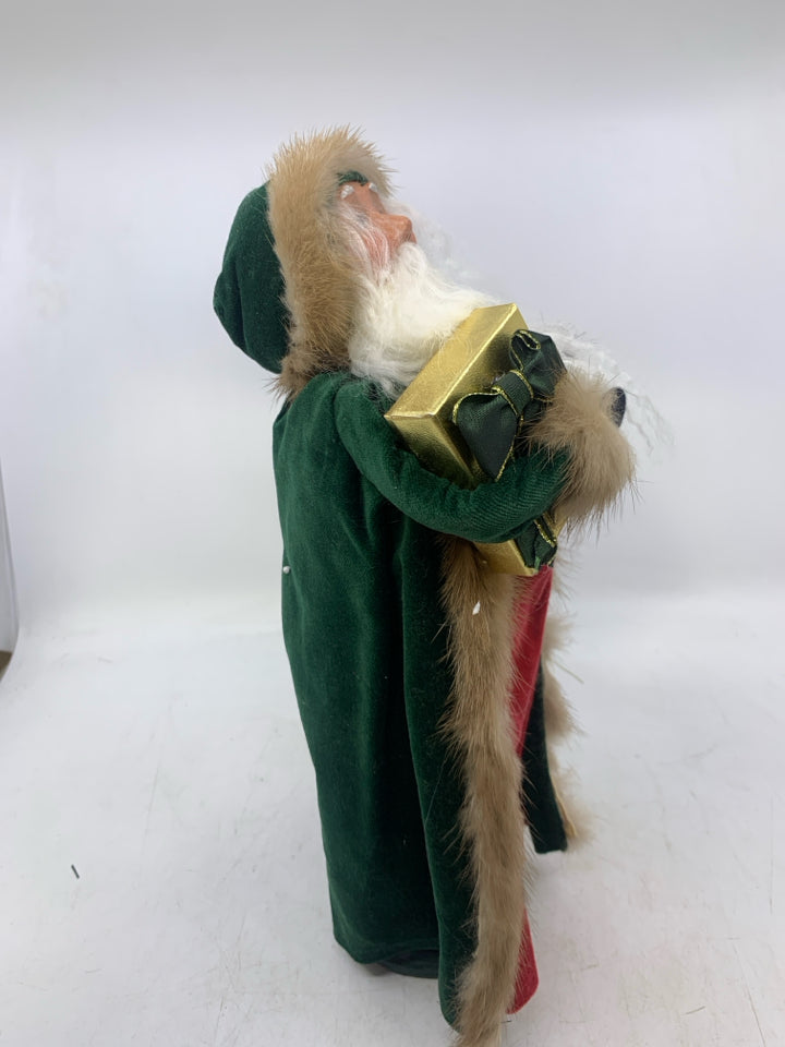 BYERS' CHOICE SANTA WITH GIFT.